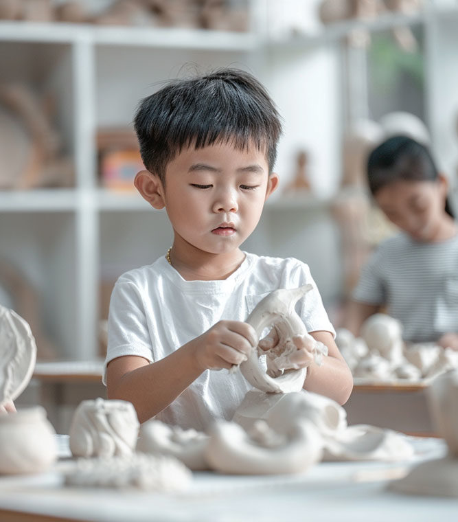 kid-making-clay-sculpture